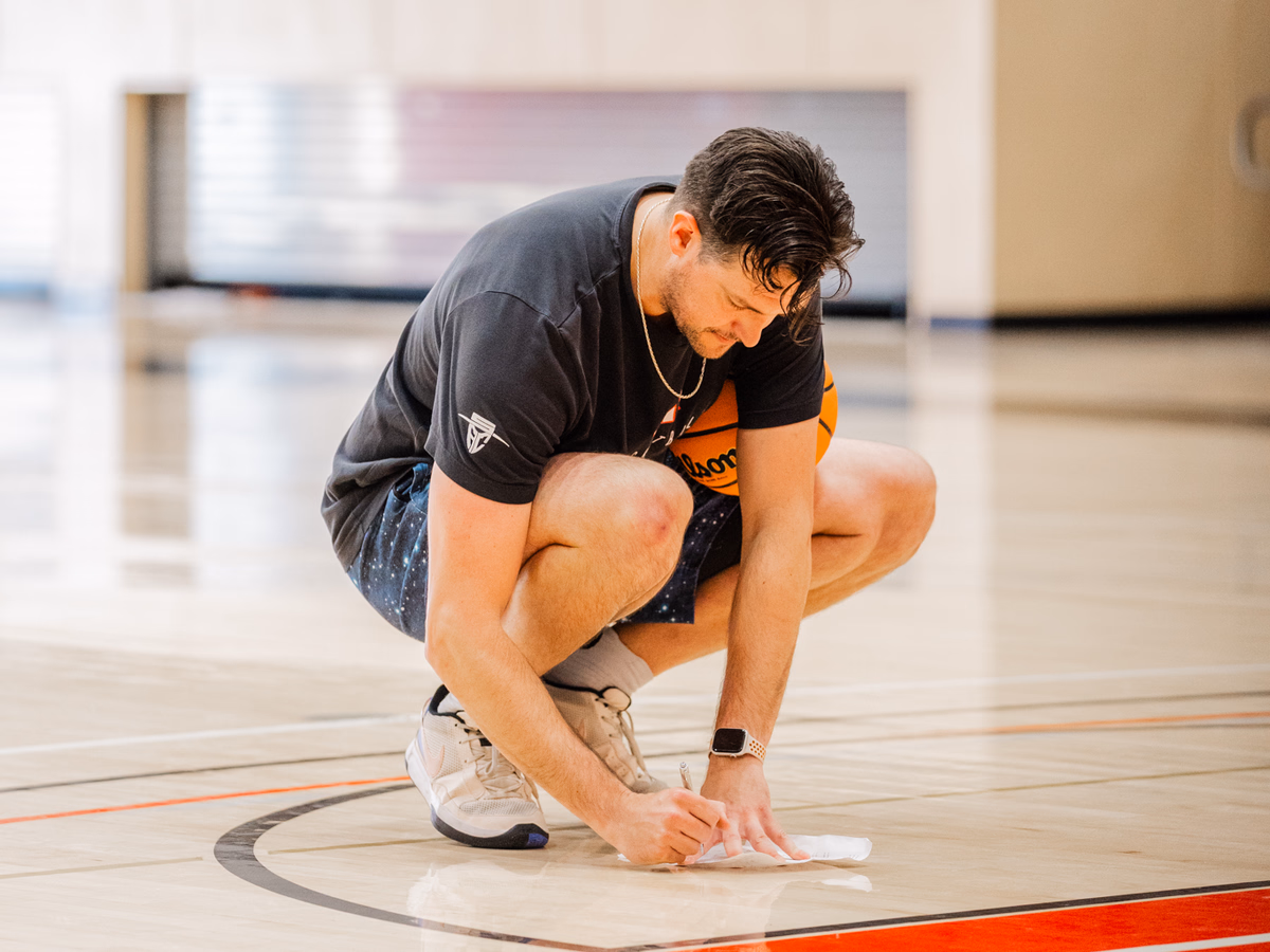 Coach Fogarty preparing on court