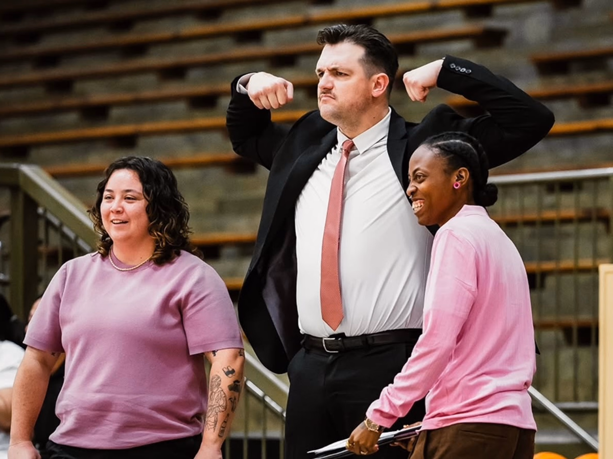 Coach Fogarty celebrating with staff